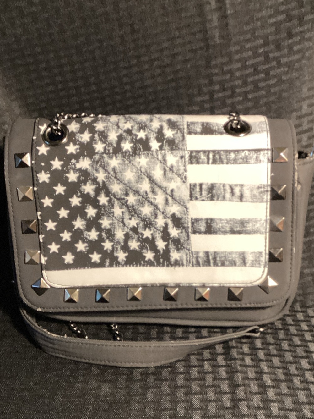Abbey Dawn “Rockstar” Flag Crossbody Bag with Studs.